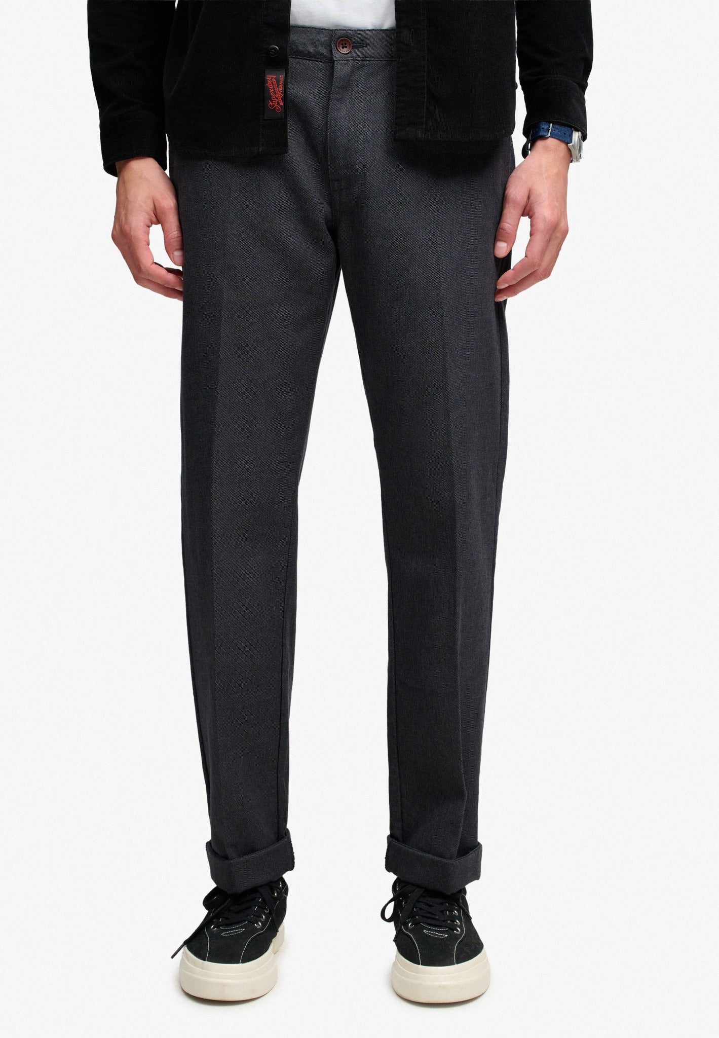 Superdry Premium Textured Regular Chino in Textured Charcoal angled view on model