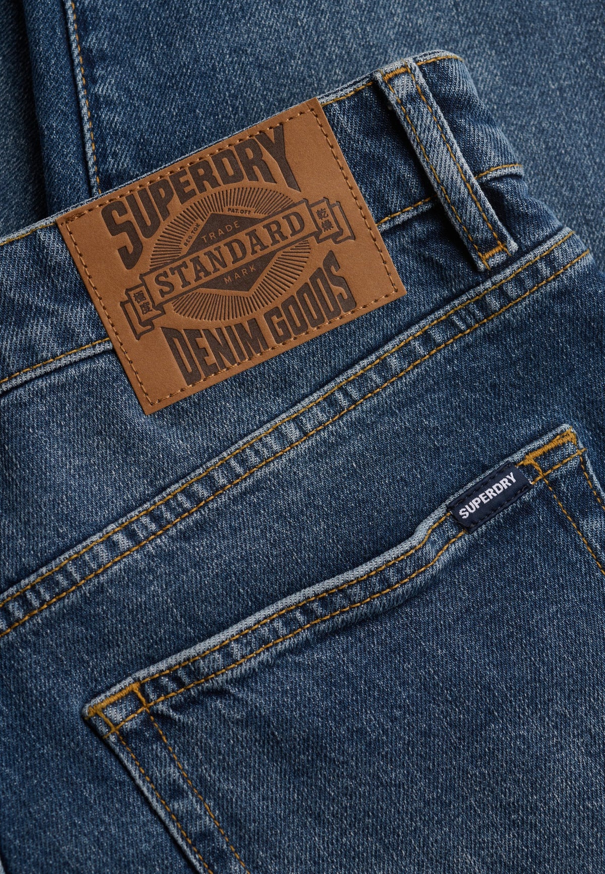 Superdry Vintage Tapered Jeans in Ranch Vintage Indigo back patch detail