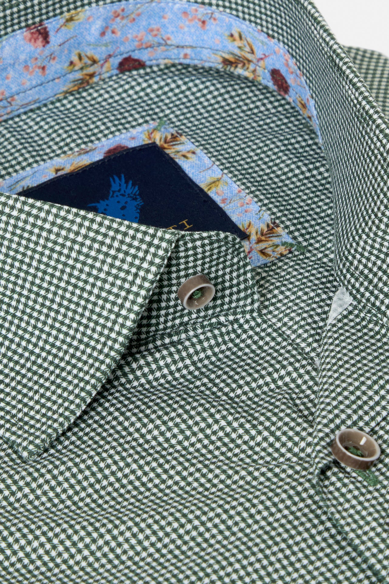 Benetti Riga Long Sleeve Forest Shirt in a close-up of the collar and button placket, with green-and-white check fabric and patterned inner collar trim.