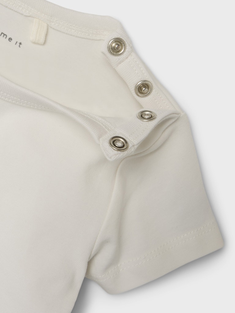 Horia Short Sleeve Top -Jet Stream-Stud opening detail