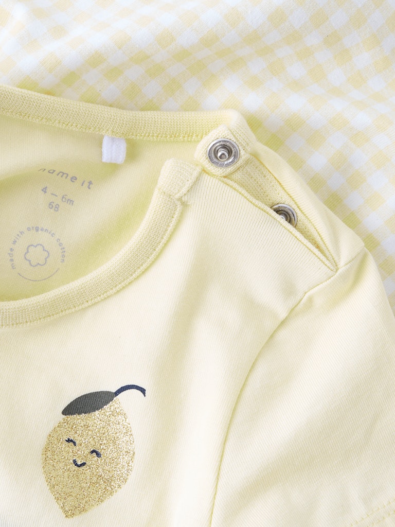 Funny Pastel Yellow Dress-Press studs view