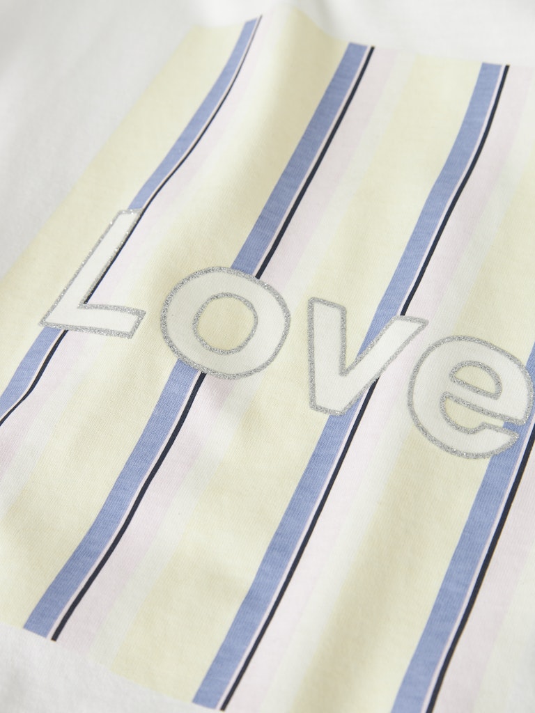 Textile with 'love' embroidery on a striped background