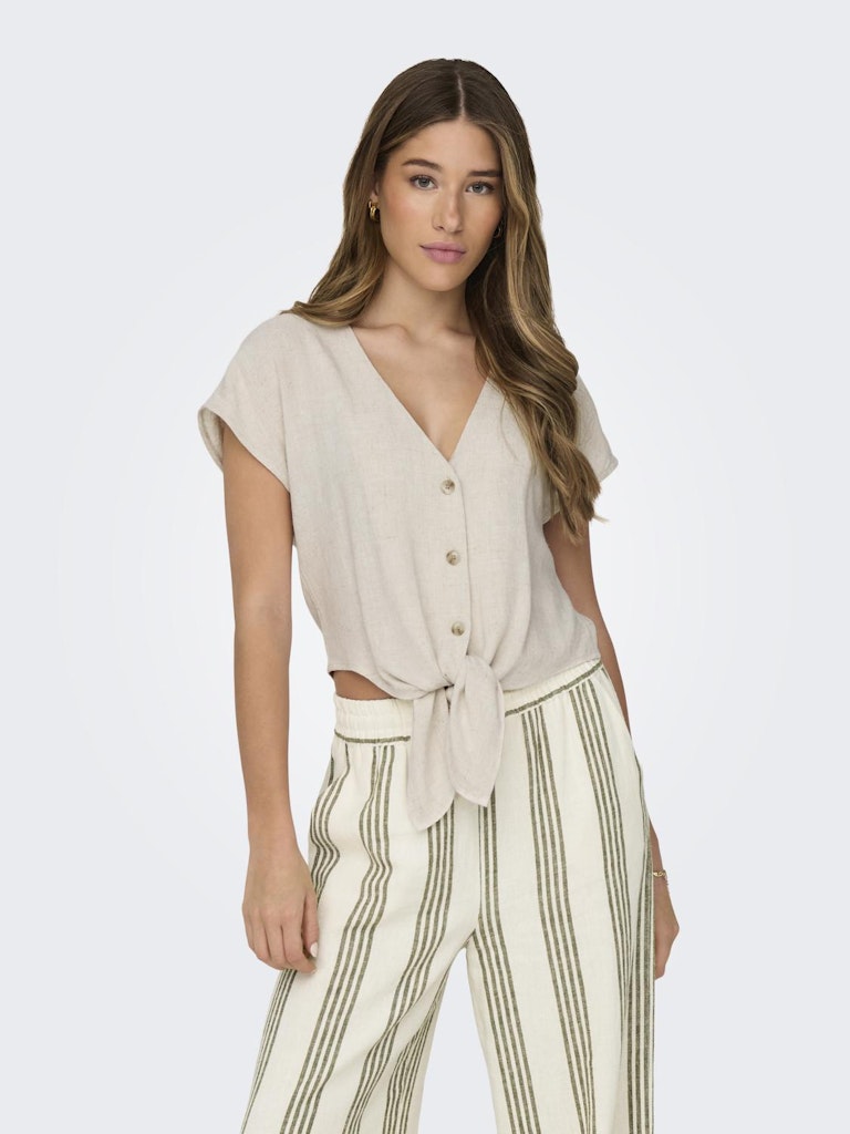 Front view of Siestra short sleeve knot top in Moonbeam