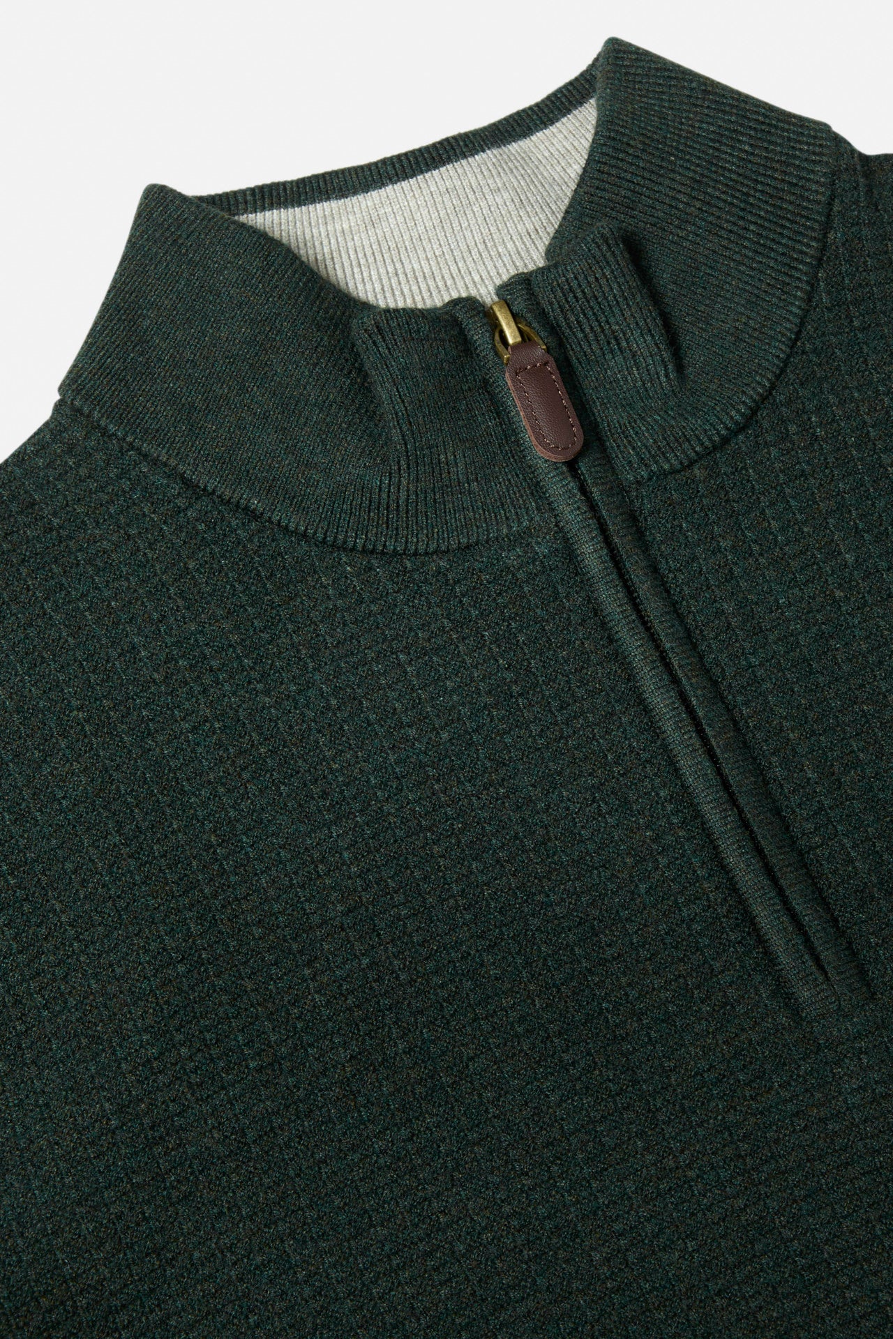 Close-up of the Benetti Oliver Forest 1/4 Zip knit, showing the ribbed collar, quarter-zip with leather pull tab, and Forest colour.