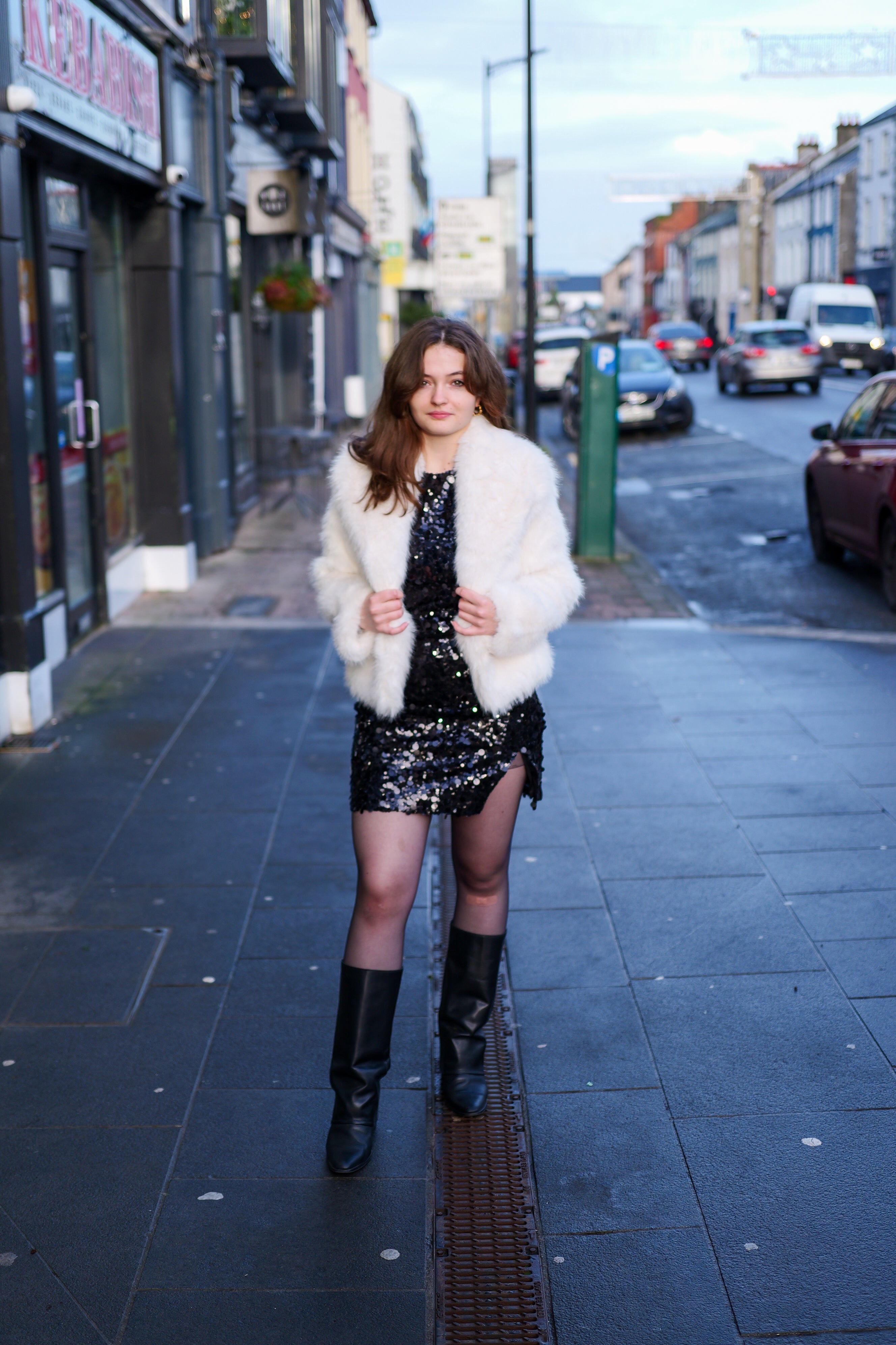 Close-up of the white faux fur jacket texture