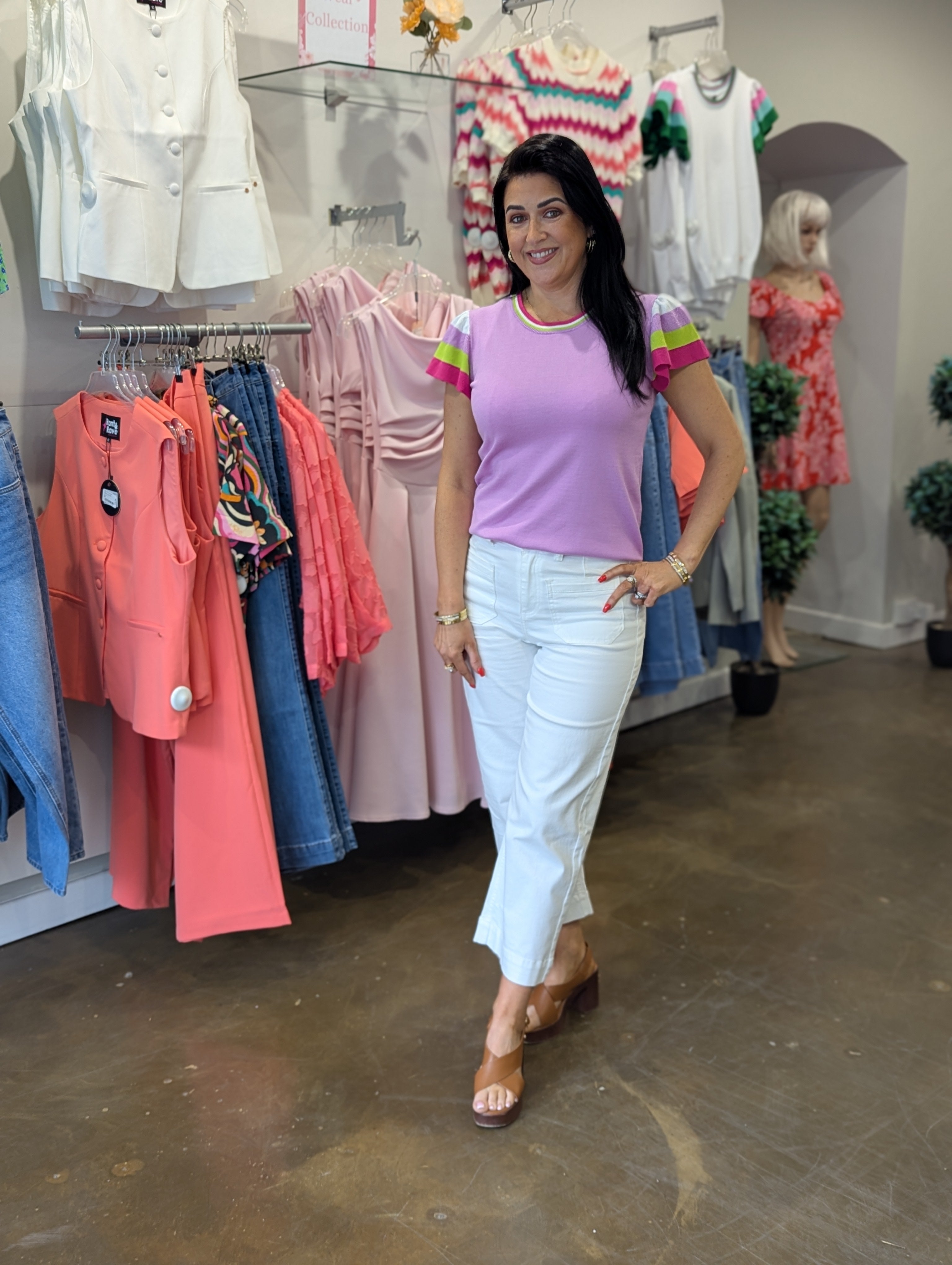 Model wearing the Enid cropped wide leg white jeans