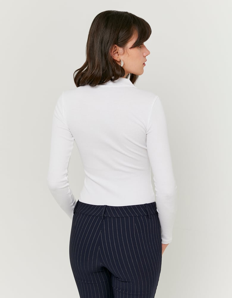 Model back view of white bodysuit