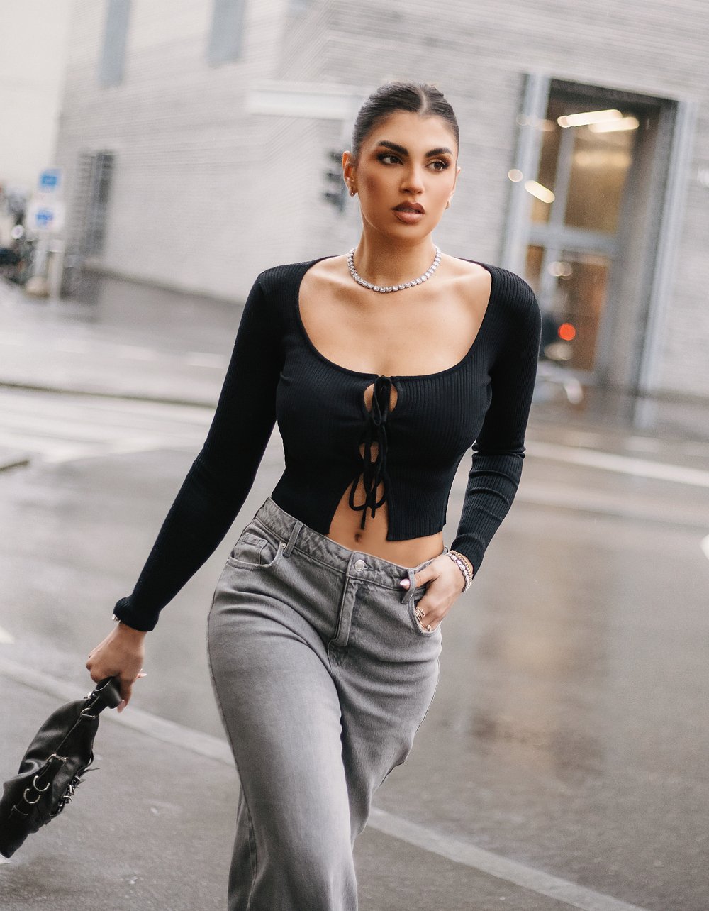 Ladies Black Knitted Cardigan With Bows-Wide View of Model & Top