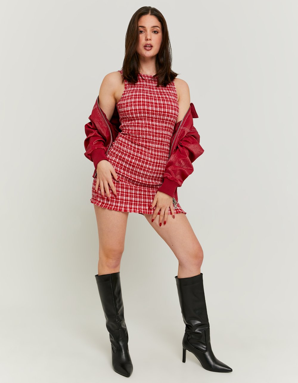 Model full front view of red and white dress