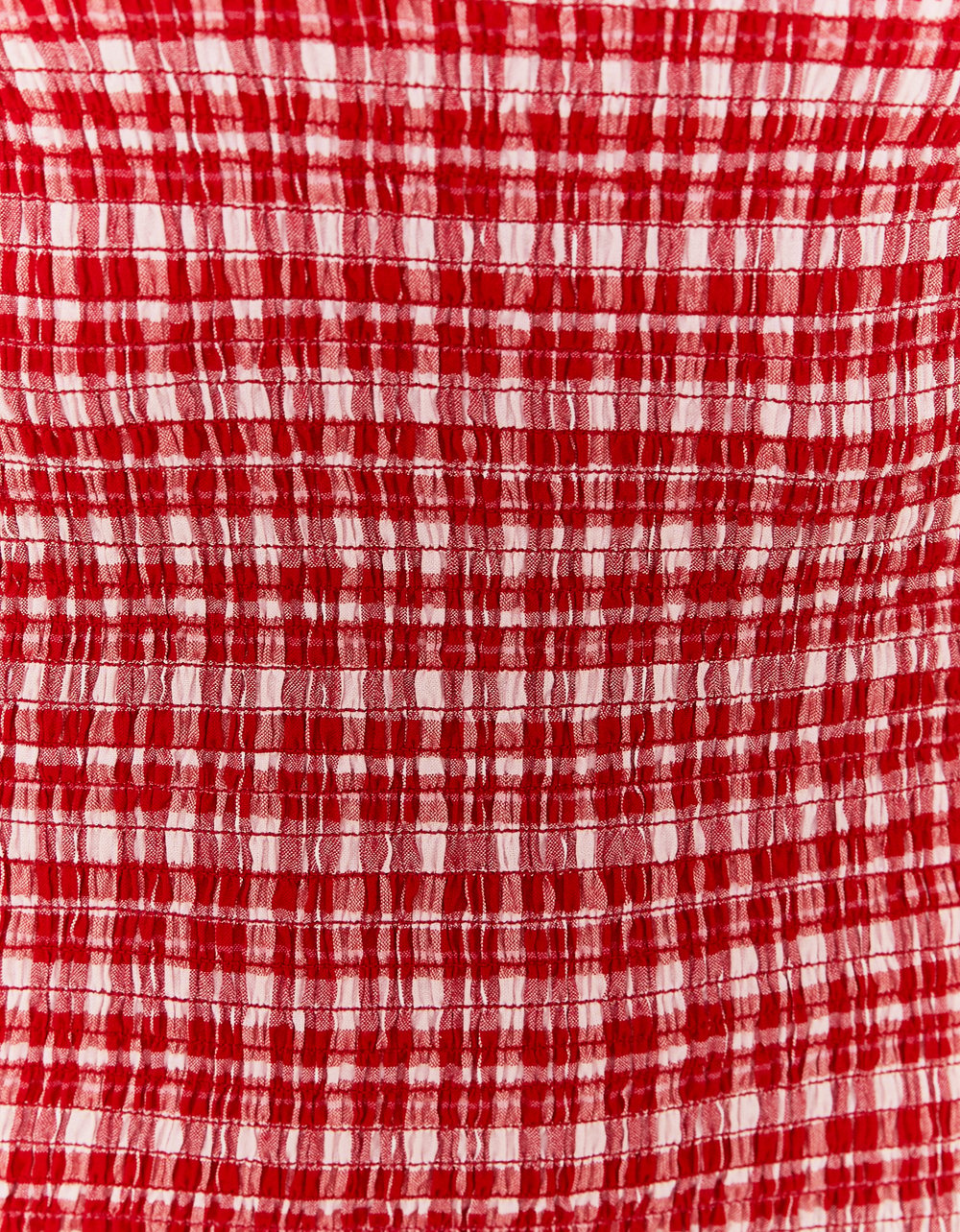 Pattern detail on Vichy print mini dress