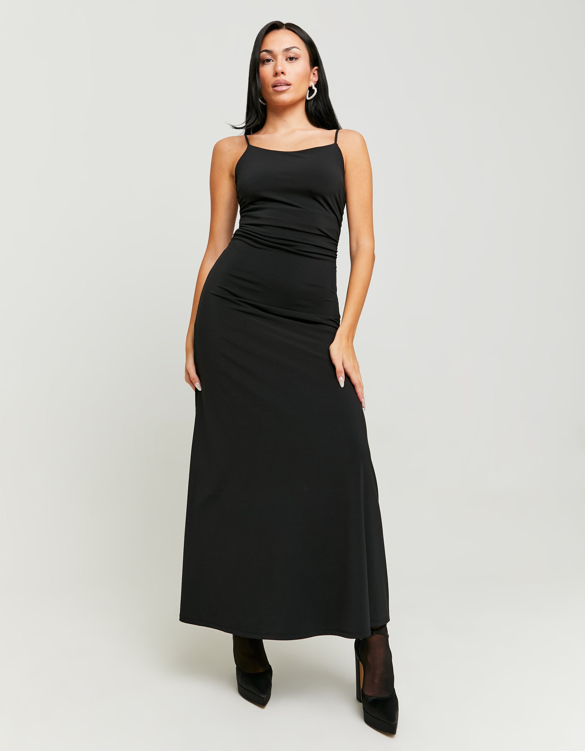 Front view of black backless maxi dress