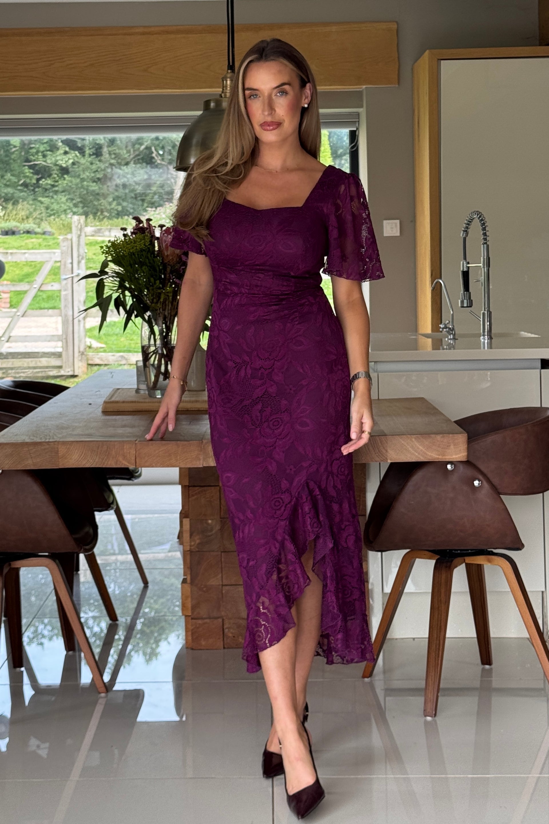 Front view of Heidi lace ruched midi plum dress