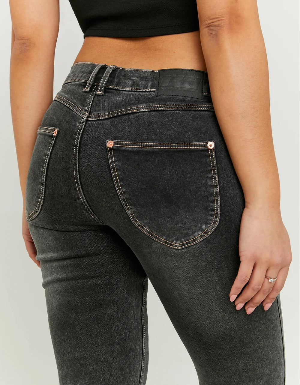 Ladies Black Low Waist Bootcut Jeans-Back Pocket View