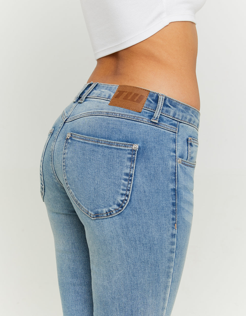 Ladies Blue Low-Waist Bootcut Jeans-Back Pocket View