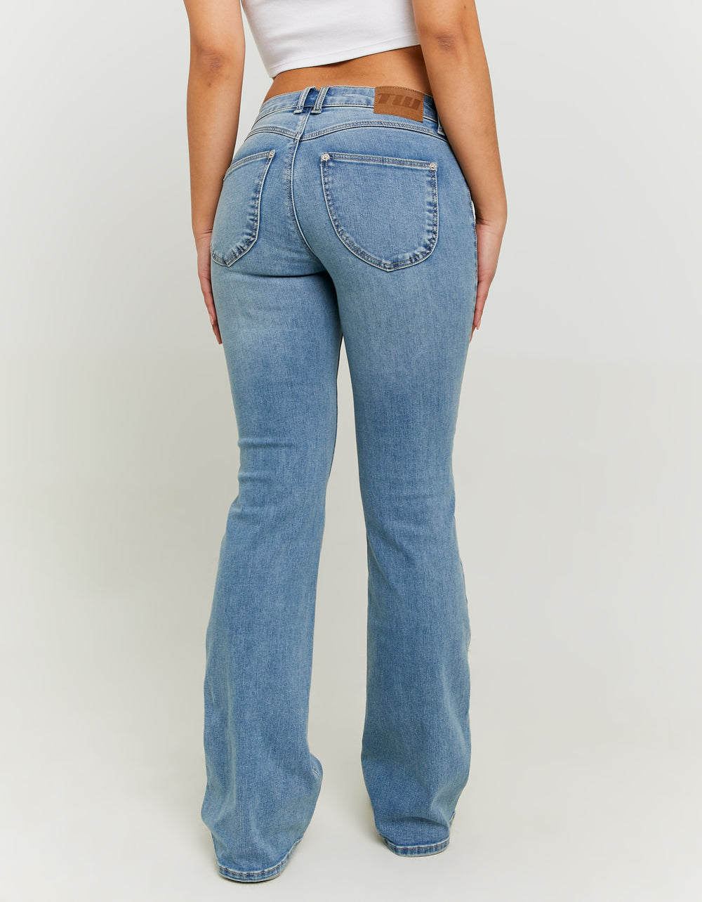 Ladies Blue Low-Waist Bootcut Jeans-Model Back View