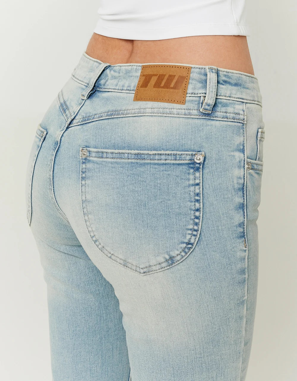 Ladies Light Wash Low Waist Bootcut Jeans-Back Pocket View