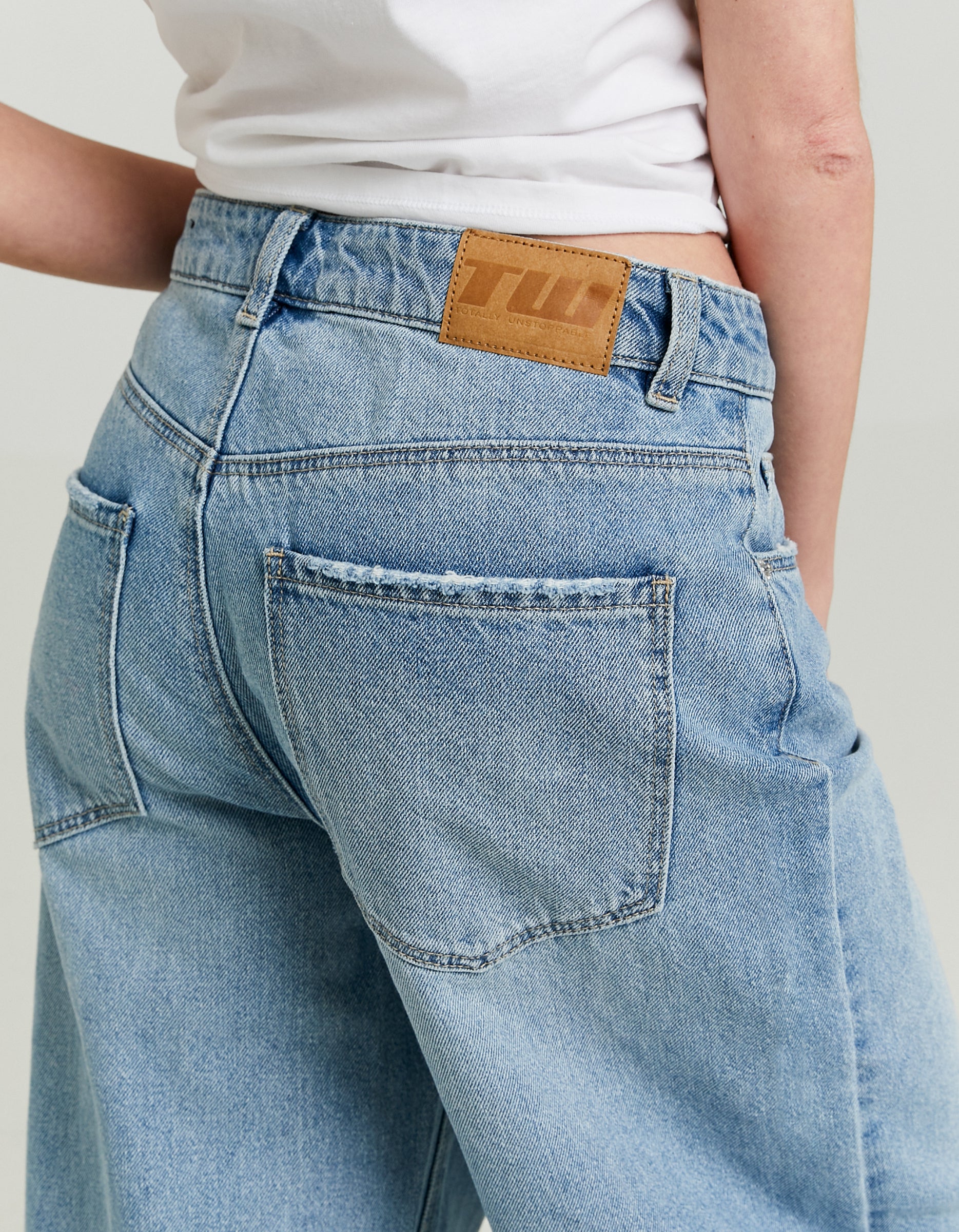 Ladies Mid-Waist Blue Baggy Jeans-Back Pocket View