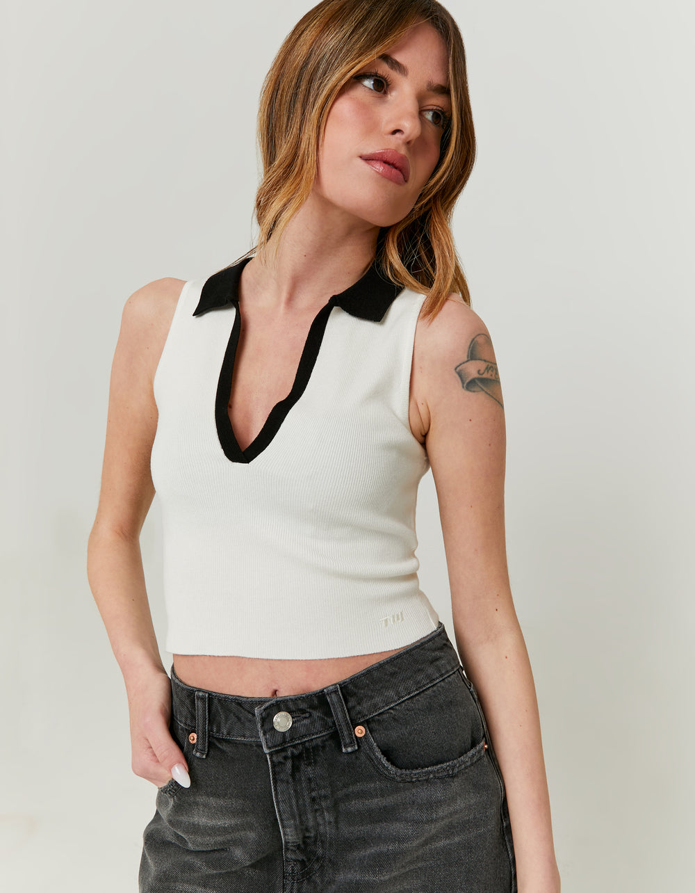 Ladies Knitted White/Black Polo Top-Closer View of Front