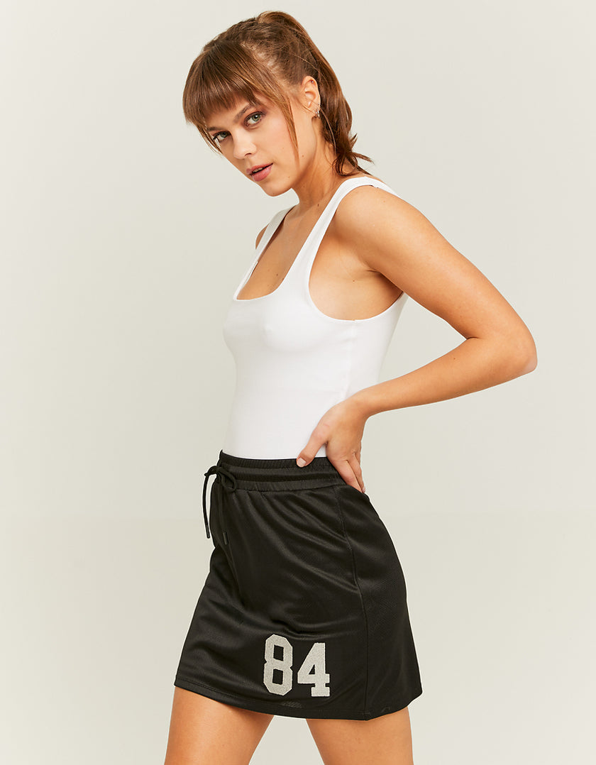 Ladies Black Varsity Mini Skirt-Model Full Front View