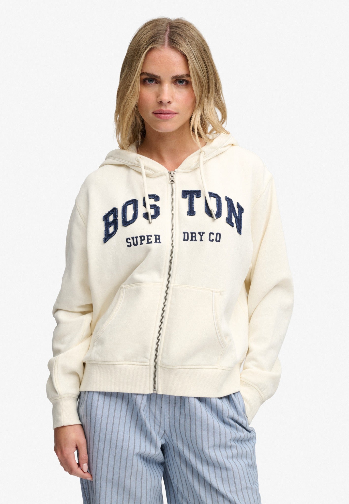 Superdry Ath Essential Relaxed Crop Ziphood in Desert Bone Off White on model