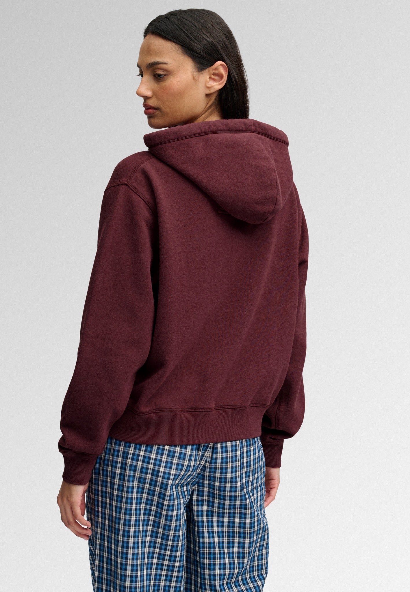 Superdry Ath Essential Applique Crop Hood in Port Red back view on model