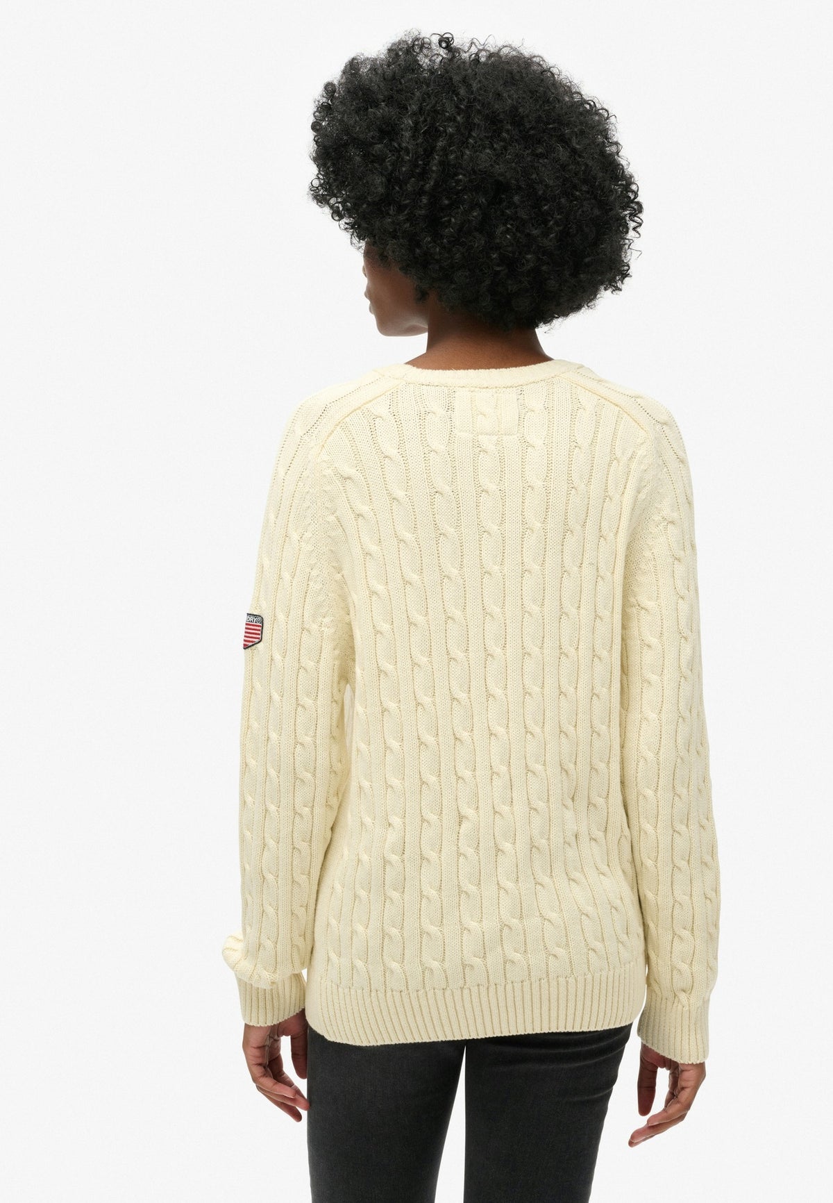 Superdry Slouchy Cable Knit in Natural White angled view on model