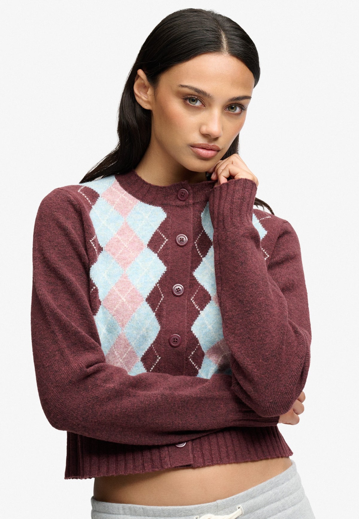 Superdry Argyle Cardigan in Aubergine Purple on model angled view