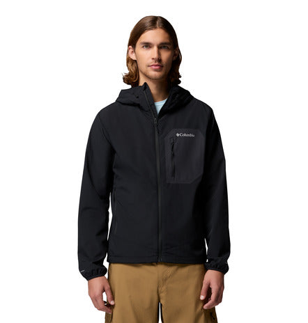 Person wearing a black Columbia jacket on a white background