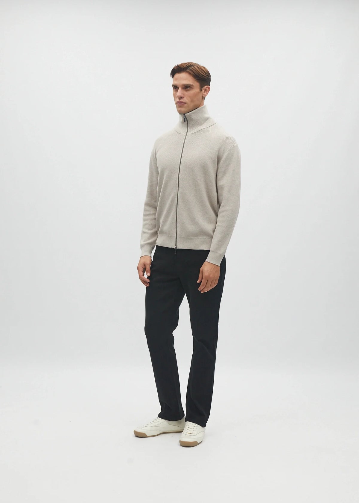 Diesel Darwin Full Zip cardigan in Beachcomber, three-quarter model view with the collar zipped up.