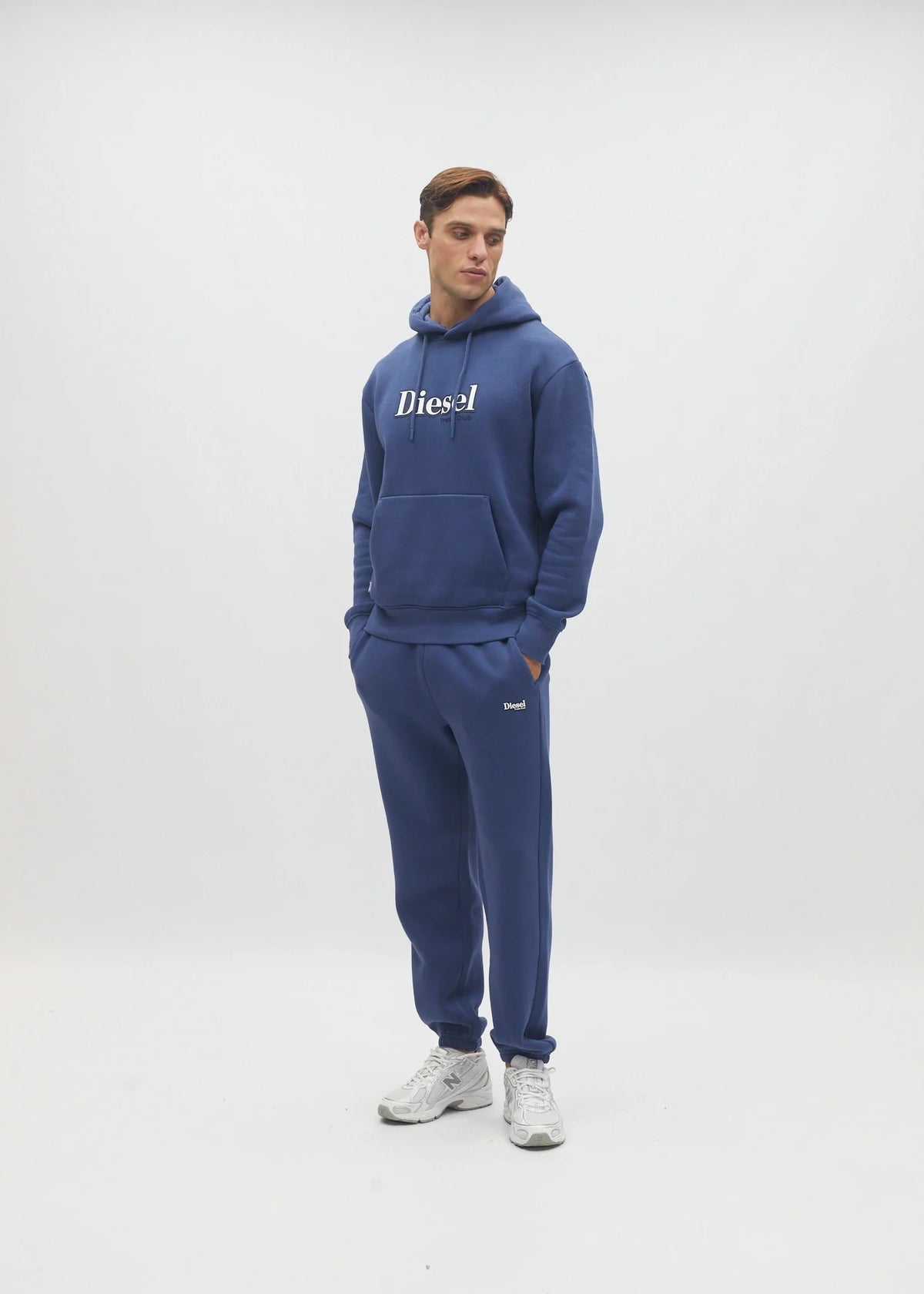 Diesel Walt Hoodie in Hugo Blue, angled model view showing the regular fit.