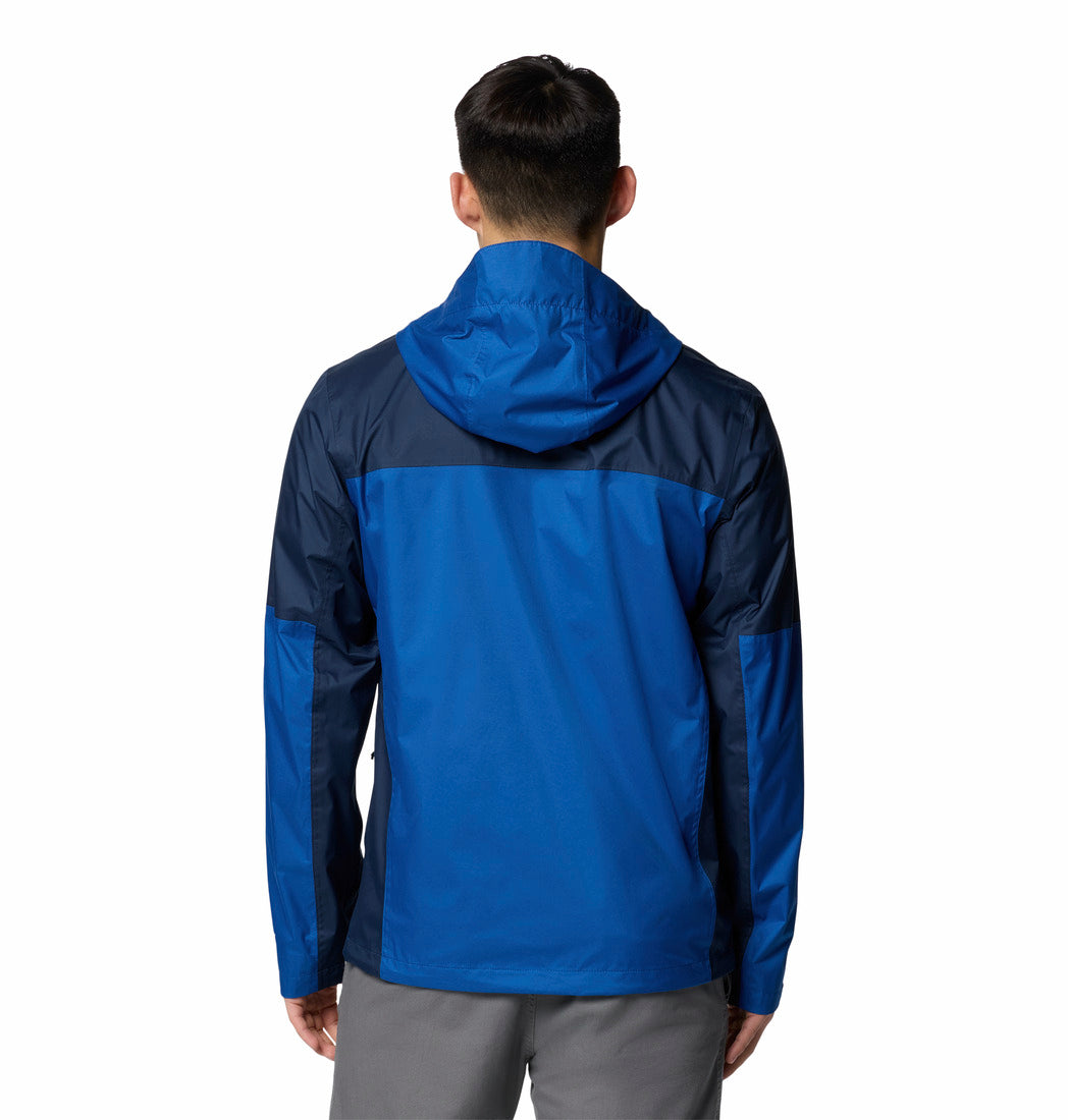 Blue and black jacket worn by a person on a white background
