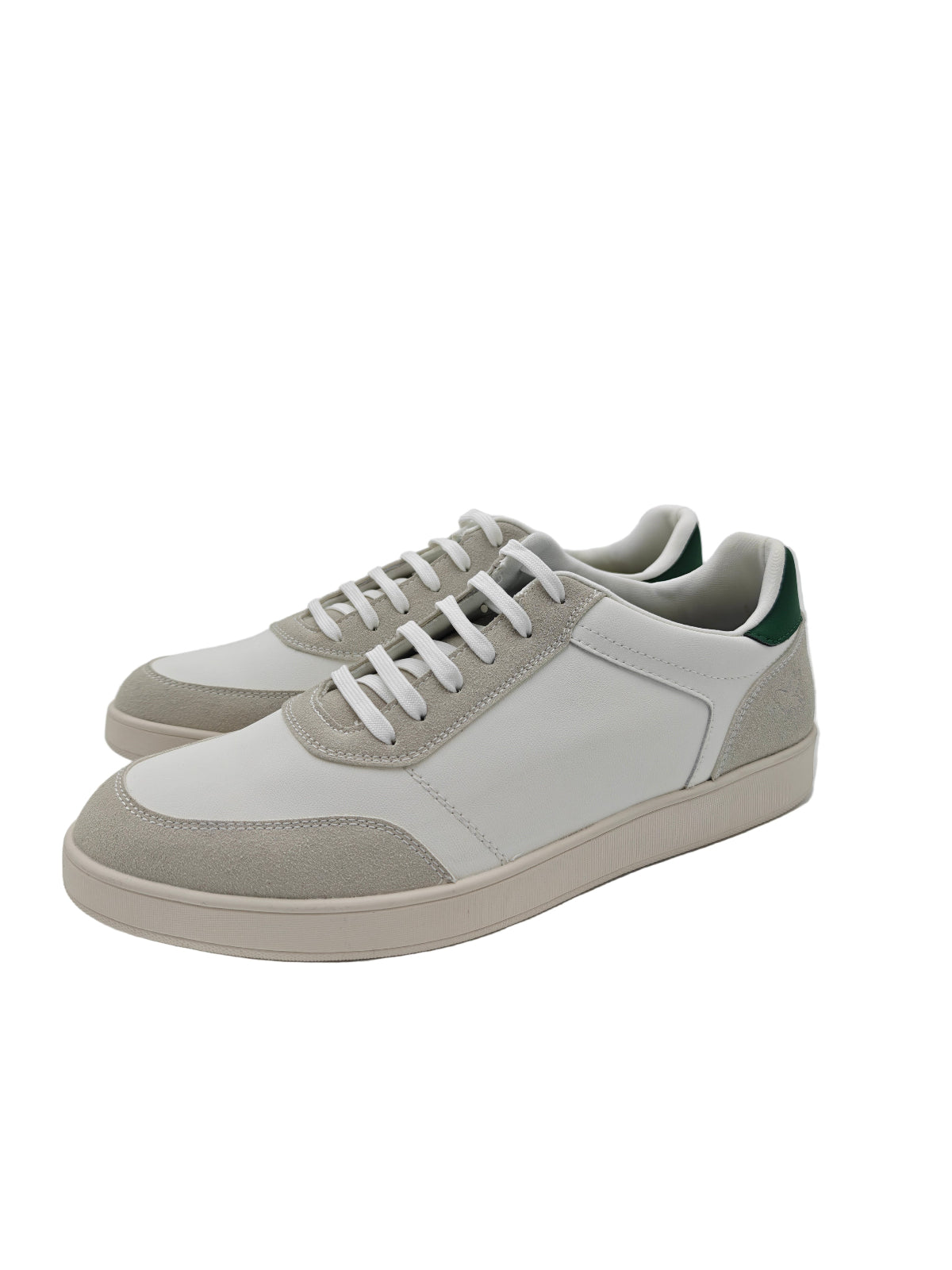 Pair of gray and white sneakers with green accents on a white background