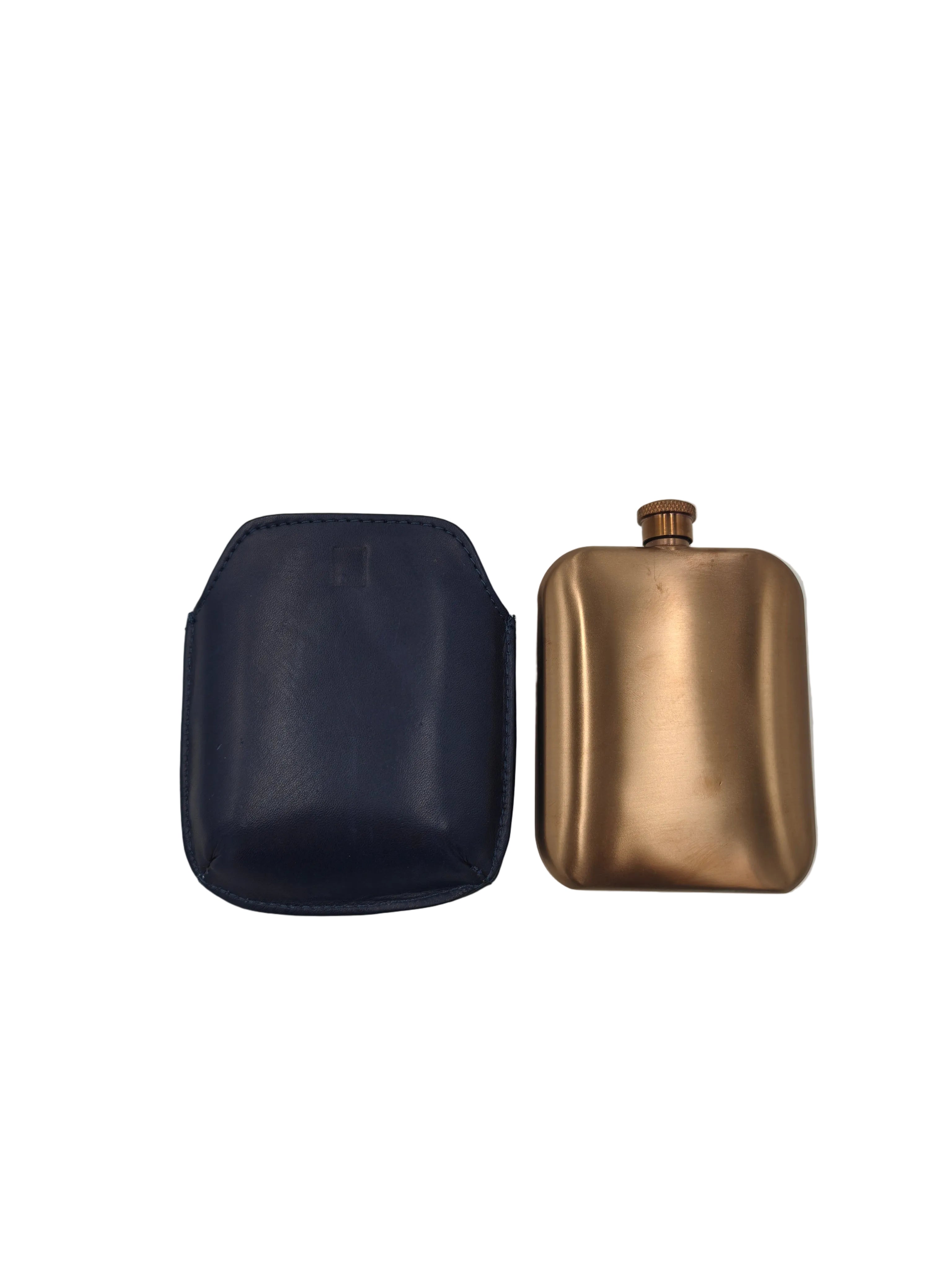 Bronze hip flask with navy leather sleeve, product view