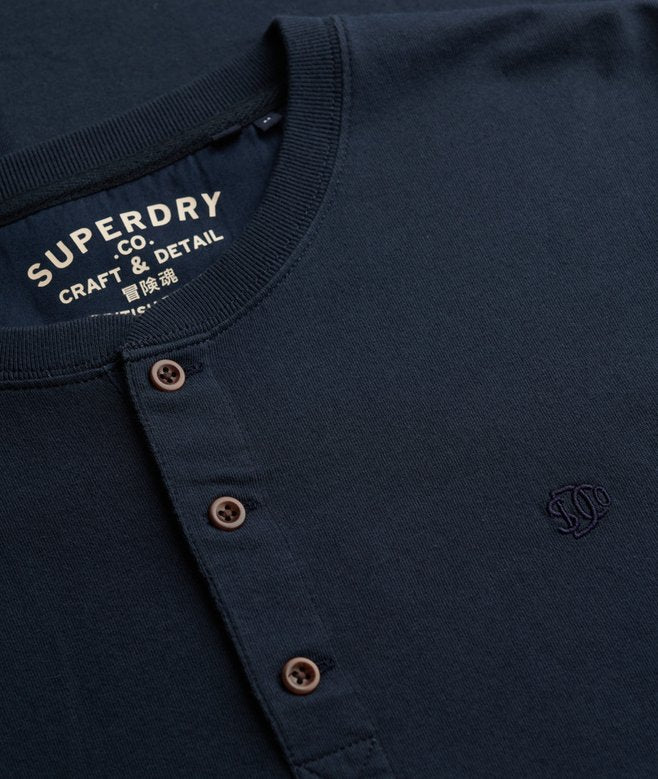 Navy blue shirt with Superdry logo and branding details