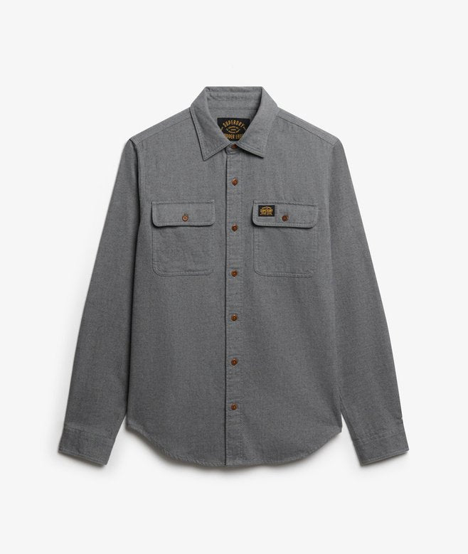 Gray-blue flannel shirt with button details on a white background