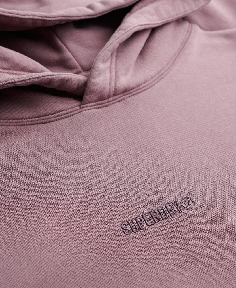 Close-up of a pink hoodie with Superdry logo