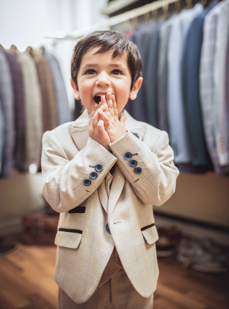 Jacket view of cream boys formal suit