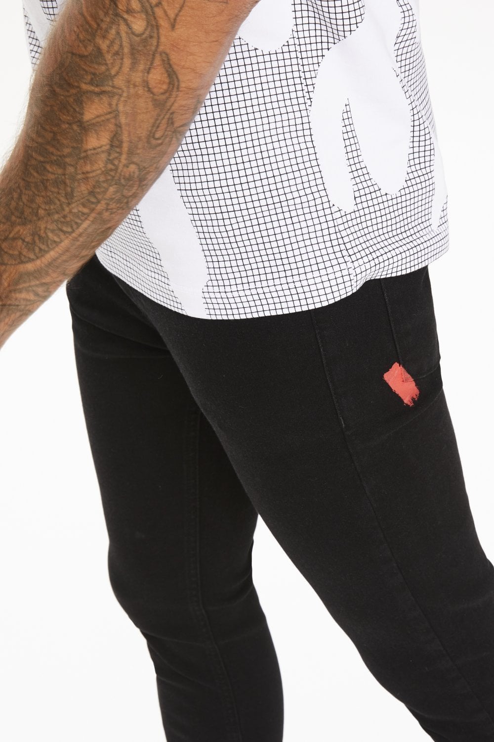 Side view of 11 Degrees black stretch skinny jeans