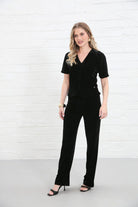 Rant & Rave Clara Trouser Black worn by model, front view, high - waisted wide - leg velvet trousers with matching black top