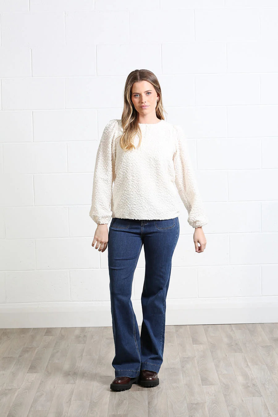 Rant & Rave Hannah top in cream, front model view with textured finish and long sleeves.