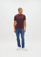 Diesel John Tee in deep burgundy worn by a model, angled front view