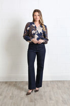 Rant & Rave Mia blue floral blouse worn by model, front full - length view