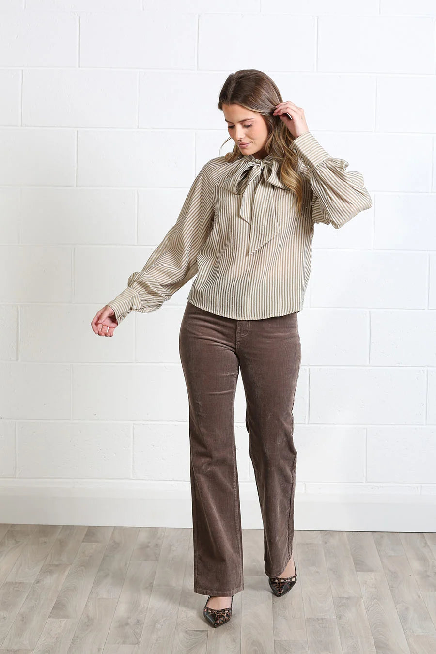 Rant & Rave Natalia top in Light Coffee, full - length front model view with tie neck and striped long sleeves.