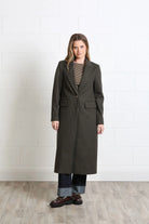 Rant & Rave Olivia Coat in deep moss, front view worn by model with striped top and jeans