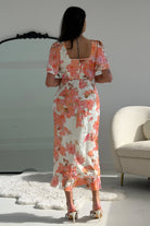 Girl In Mind Heidi Floral Print Ruched Midi Dress Peach/White model front view