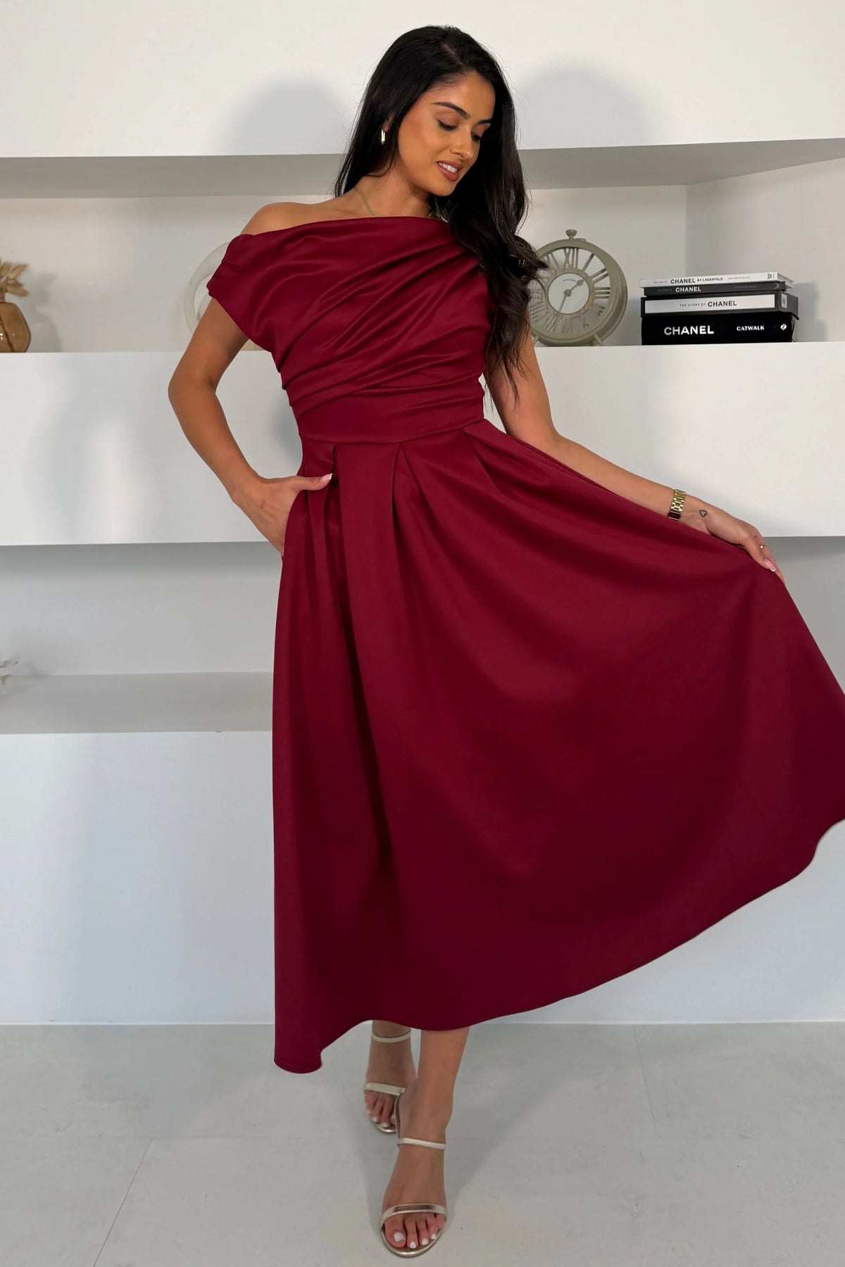 Girl In Mind Betty asymmetric neckline skater midi dress in wine, worn by model, front view with gathered bodice and full skirt