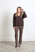 Rant & Rave Sophia Top in chocolate dot print, front view worn by model with V-neck and long sleeves.