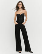 Tally Weijl black high waist wide leg jeans worn by model, front view
