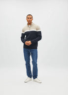Diesel Tully Half Zip Sandshore sweater in sand, front view worn by model with white stripe and navy block.