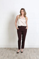 Rant & Rave Valerie Slim Trouser in aubergine, front view worn by model with hands in pockets